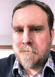 Echoes of NIU history resonate loudly for HESA students in archival  research