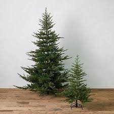 Artificial Christmas Trees That Ll Save You A Ton Of Stress This Season Best Artificial Christmas Trees Realistic Artificial Christmas Trees Realistic Christmas Trees