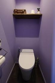 リノベーション事例集 ヴィンテージ調の無垢フローリングにブリックタイルが映える青い空間 無垢 フローリング トイレのデザイン リノベーション