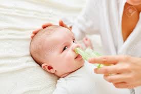 Nose From An Infant Is Freed Of Mucus With The Nasal Aspirator Stock Photo Sponsored Paid Freed Mucus Nos In 2020 Nasal Spray Saline Nasal Spray Blocked Nose