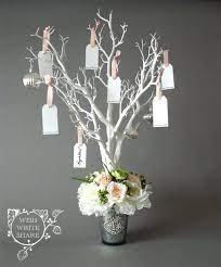 Get a wide round bowl and cover its mouth with lattice cover the whole outside of a glass jar with tree branches cut to size and gain a beautiful rustic vase. 26 Best Tree Branch Centerpieces To Add Charm To Your Table In 2021