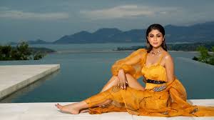 The plots are simple and easy to follow and the characters make you feel emotional. Brunette Bollywood Girl Indian Actress Shilpa Shetty With Yellow Dress In Background Of Sea Mountain And Cloudy Sky Hd Shilpa Shetty Wallpapers Hd Wallpapers Id 54605