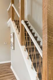 A wooden railing is between $750 and $1,250. From Blueprints To A Lake House Full Of Life Stair Banister Stairs Design House Stairs