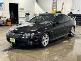 Image result for Dark Otter Gray 2004 Pontiac