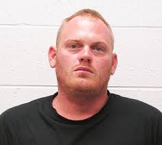 Man allegedly found with stolen gun, drugs after wrecking his motorcycle