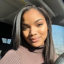 Medium iced oat milk latte with hazelnut flavor