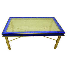 Here's a coffee table that's 16 inches high with 31.5 in diameter. Bamboo Float Coffee Table Antique Gold Asian Coffee Tables By Dessau Home Houzz