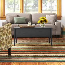 This cocktail table is characterized by traditional style and finish, but its design has been jazzed up a bit with rounded corners and wide turned legs. Andover Mills Siena Lift Top Coffee Table Reviews Wayfair