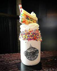 Delicious & convenient treat with a choke free cap. I Ate Funfetti Milkshake At Toothsome S Chocolate Emporium In Orlando Yummy Food Dessert Food Cute Desserts