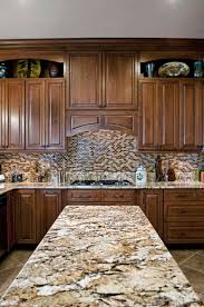 At present, the areas above the 6 inch granite backsplash are painted the same light color as the rest of the kitchen. Granite Backsplash How To Choose Between 4 Full Height