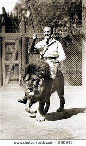 Vintage Photo Of A Lion Tamer Rides Lion In Show Weird Vintage Vintage Circus Animals
