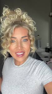 Live curly bun hair...