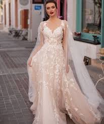 Our search program allows you to search using the kind of fabric you want, the length of the dress or that particular silhouette or even the season of the year. Solomia Bridal Dress Come True