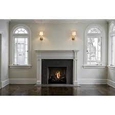 The buffet and artwork fit seamlessly into a nook beside the fireplace, while the light blue curtains are a focal point opposite it. Fireplace Millwork Traditional Living Room Cameo Homes Found On Polyvore Grey Fireplace Transitional Living Rooms Fireplace Surrounds