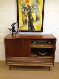 An antique record cabinet offers mahogany construction with slightly bowed front having single door opening to shelved interior housing vinyl record collection and raised on cabriole. Mid Century 1950 S Rosewood Record Player Light Up Drinks Cabinet Bar Ebay Modern Antique Furniture Drinks Cabinet Furniture