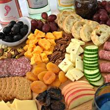 I love to use this round wooden board from amazon. How To Make A Meat And Cheese Platter Juggling Act Mama