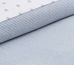 The duvet cover features a woven denim blue ticking stripe on an antique white base. Yarn Dye Ticking Stripe Kids Duvet Cover Pottery Barn Kids