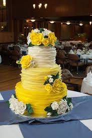 Wedding Cake All Flowers Are Handmade From Gumpaste 6 9 And 12 Inch Tiers Decorated In Fondant Yellow Wedding Cake Round Wedding Cakes Wedding Cake Ombre