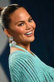 Chrissy Teigen reveals baby bump after 2-year pregnancy loss