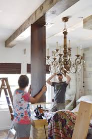 I wanted the faux beams to be suspended, and not run along the ceiling since it was going to be impossible to do that because of the way the ceiling lines were. Diy Faux Wood Beams