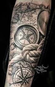 The One In Front Of The Gun Lives Forever Tattoo Black Clock Tattoo With Standing Gate The Night Circus Laid Over A Map Of Alegasia Eragon Sleevetattoos Rope Tattoo Compass Tattoo Nautical Tattoo