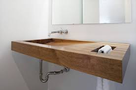 Different ways to integrate wood in your bathroom. Bathroom Design Idea Install A Wood Sink For A Natural Touch