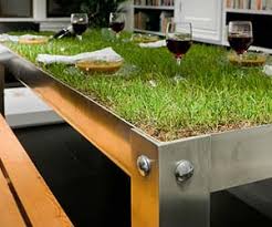 A trestle table (even one without benches) instantly evokes the look and feel of a picnic table. Indoor Grassy Picnic Table