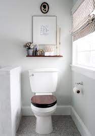 This cute diy rope towel holder is the perfect combination of keeping things out of the way and being decorative. 10 Ingenious Half Bath Decorating Ideas Inspirational 10 Fancy Toilet Decorating Ideas Shelves Above Toilet Small Toilet Room Shelves Over Toilet