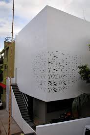 This vertical planter turns a blank exterior wall into gorgeous piece of living art. India House Design With Amazing Exterior Walls And Courtyard