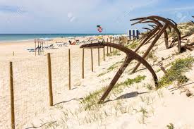 Praia do barril, uma âncora de tavira: Tavira Portugal The Cemiterio Das Ancoras Anchor Cemetery A Major Landmark In Praia Do Barril Beach In Ilha De Tavira Island Stock Photo Picture And Royalty Free Image Image 148170898
