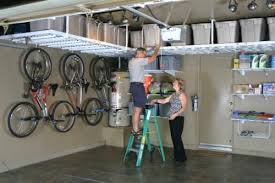 Organization And Storage Secrets For Large Families Monkey Bars Garage Storage Systems Garagen Innen Garagen Renovieren Kleine Garage Organisation