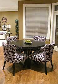 Breakfast Nook Features Round Table Zebra Chairs Coordinated With Adjacent Family Room Luxury Home Loca Round Dining Table Dining Table Dining Room Design