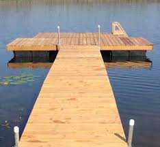 It involves 4 empty barrels, wood and some rope to build it. Dock Hardware Floats Lumber Madoc Ontario