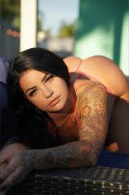 OnlyFans Model in beach - FameRegistry.com