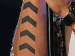 Liam added a giant watch and gears to his tattoo collection in march 2016. Which Liam Payne Tattoo Are You Tattoos Liam Payne Arrow Tattoos