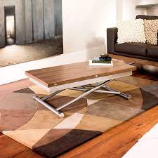 Well, not only a coffee table, but a table that can go from the height of a coffee table to a dining table. Rise Extending Coffee Table Walnut Dwell 449 Coffee Table Extendable Coffee Table Small Dining Table