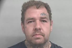 Man 'minding his own business' lost teeth after being viciously punched  from behind