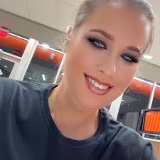 What hotels in Disney Springs offer free breakfast and shuttle to the theme  park?