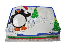 A sheet cake or slab cake is a cake baked in a large, flat rectangular pan such as a sheet pan or a jelly roll pan. Penguin In Snow With Christmas Tree Cake