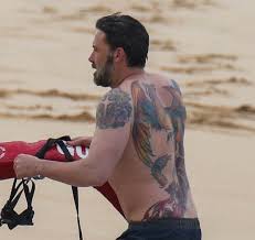 Two years after claiming his massive phoenix rising from the ashes tattoo was fake for a movie, new photos surfaced on monday showing the shirtless justice league actor on a beach in hawaii with his gnarly tat on full display. Behold Ben Affleck S Massive Back Tattoo Whatsup Cairo