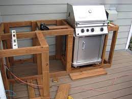 The outdoor kitchen space will go alongside the grill and will be the set for the new cooking show. Build Outdoor Kitchen Cabinets Built Cabinet Small Kitchen Modern Home Design Decor Build Outdoor Kitchen Outdoor Kitchen Cabinets Diy Outdoor Kitchen