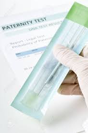 Doctor Holding Buccal Swab On Paternity Dna Test Result Chart