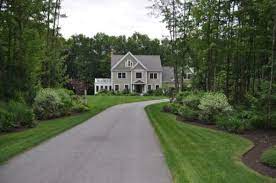 This is an example of a farmhouse front yard driveway in new york. 28 Landscaping Along A Driveway Ideas Driveway Landscaping Landscape Design Driveway