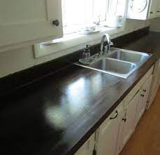 How To Make Laminate Countertops Look Like Wood For Less Than 100 00 Sheep Shop Painting Kitchen Countertops Laminate Countertops Diy Countertops