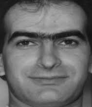 a) Gray-scale input image (b) Detected and cropped face (c) Cropped...