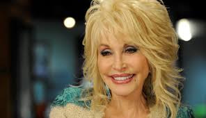 Dolly parton's signature 60's beehive. Fact Check Dolly Parton Donated To Moderna S Covid 19 Vaccine Studies
