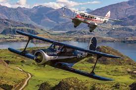 Beechcraft Staggerwing Dominie Over Lake Wanaka Aviation Vintage Aircraft Aircraft Photos