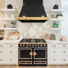 Learn how to build a marble island for your kitchen! White Enamel Range Hood Design Ideas