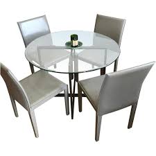 Create an elegant sitting area in your living room with a selection of living room chairs. Crate Barrel Glass Round Dining Table W 4 Leather Chairs Aptdeco