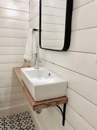 Small Powder Room With Shiplap Walls Cement Floor Tiles Wall Mounted Sink With Custom Wood Sink She Small Bathroom Sinks Powder Room Small Tiny Bathroom Sink